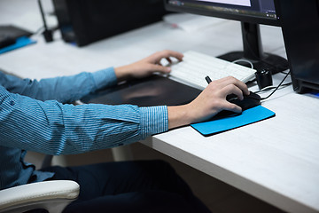 Image showing photo editor at his desk