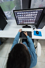 Image showing photo editor at his desk