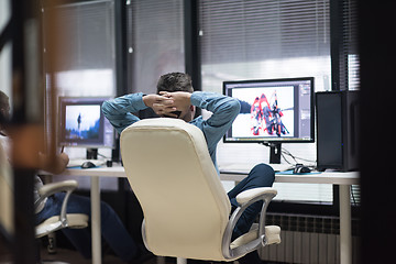 Image showing photo editor at his desk