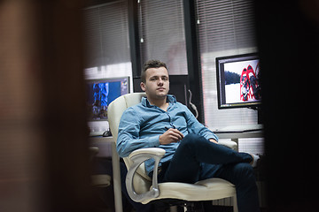 Image showing photo editor at his desk