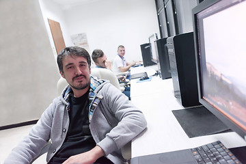 Image showing photo editor at his desk