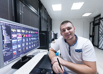 Image showing photo editor at his desk