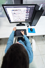 Image showing photo editor at his desk