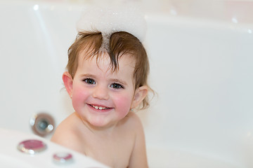 Image showing little girl taking spa bath