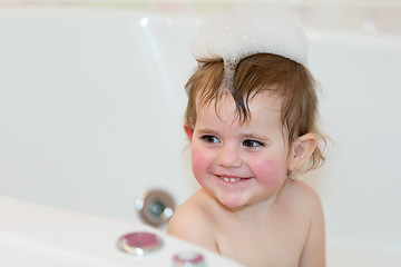 Image showing little girl taking spa bath