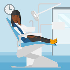 Image showing Woman suffering in dental chair.