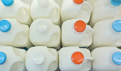 Image showing milk bottles on shelf