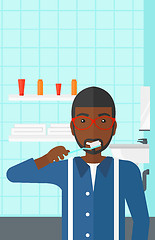 Image showing Man brushing teeth.