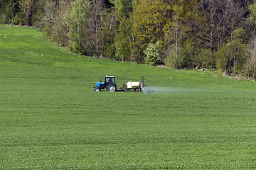 Image showing tractor in the field 