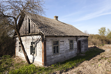 Image showing collapsing wooden farmhouse 