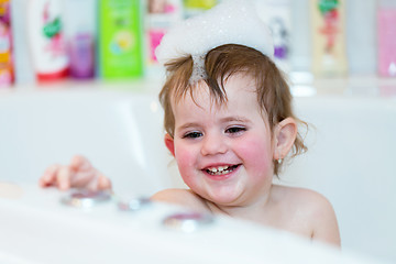 Image showing little girl taking spa bath