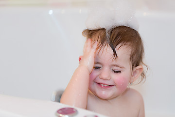 Image showing little girl taking spa bath