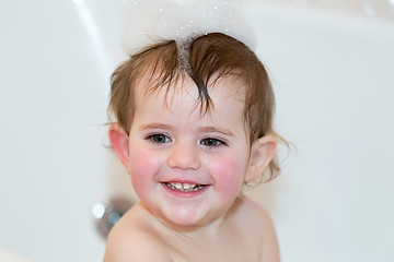 Image showing little girl taking spa bath