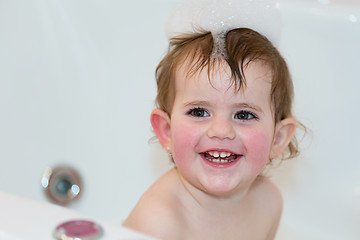 Image showing little girl taking spa bath