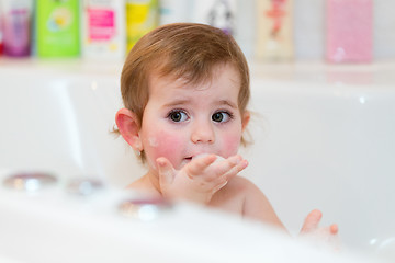 Image showing little girl taking spa bath