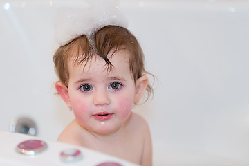 Image showing little girl taking spa bath