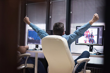 Image showing photo editor at his desk