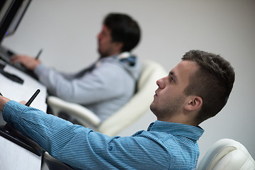 Image showing photo editor at his desk