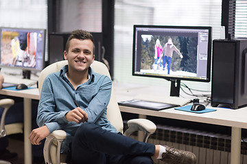 Image showing photo editor at his desk