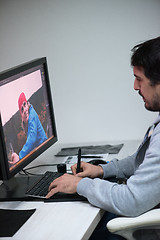 Image showing photo editor at his desk