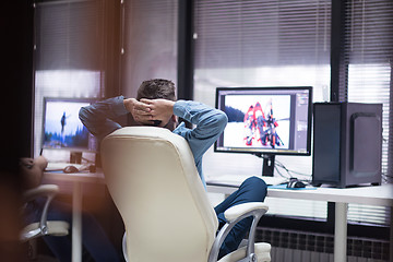 Image showing photo editor at his desk