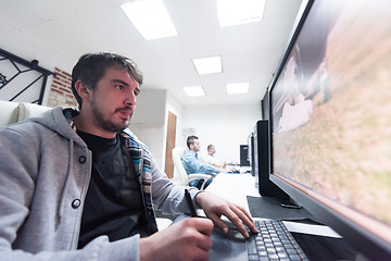 Image showing photo editor at his desk