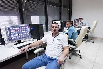Image showing photo editor at his desk