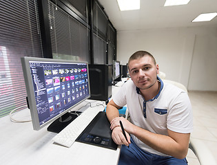 Image showing photo editor at his desk