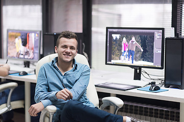 Image showing photo editor at his desk