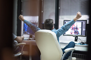 Image showing photo editor at his desk