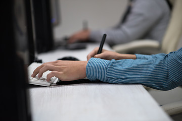 Image showing photo editor at his desk