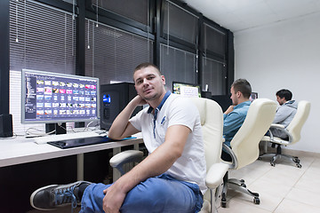 Image showing photo editor at his desk