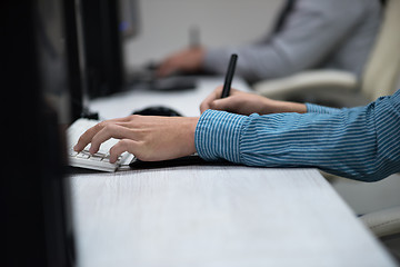 Image showing photo editor at his desk