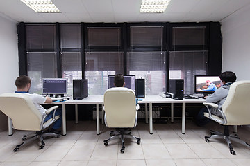 Image showing photo editor at his desk