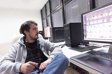 Image showing photo editor at his desk