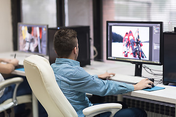 Image showing photo editor at his desk