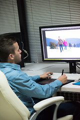 Image showing photo editor at his desk