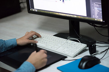 Image showing photo editor at his desk