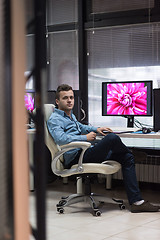 Image showing photo editor at his desk