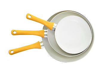 Image showing Set of three frying pans, yellow