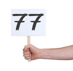 Image showing Sign with a number, 77