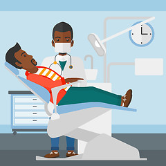 Image showing Dentist and man in dentist chair.