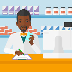 Image showing Pharmacist taking notes.