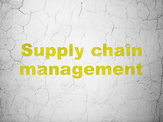 Image showing Advertising concept: Supply Chain Management on wall background