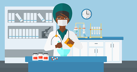 Image showing Pharmacist preparing medicine.