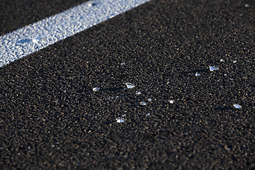 Image showing Glass on the road  
