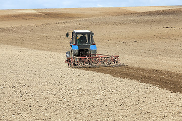 Image showing tractor in the field  