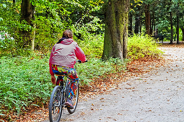 Image showing Woman on the bicycle in the park