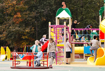 Image showing Children playing in an outdoor playground