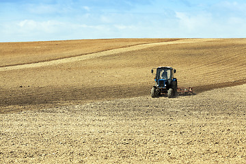Image showing tractor in the field  